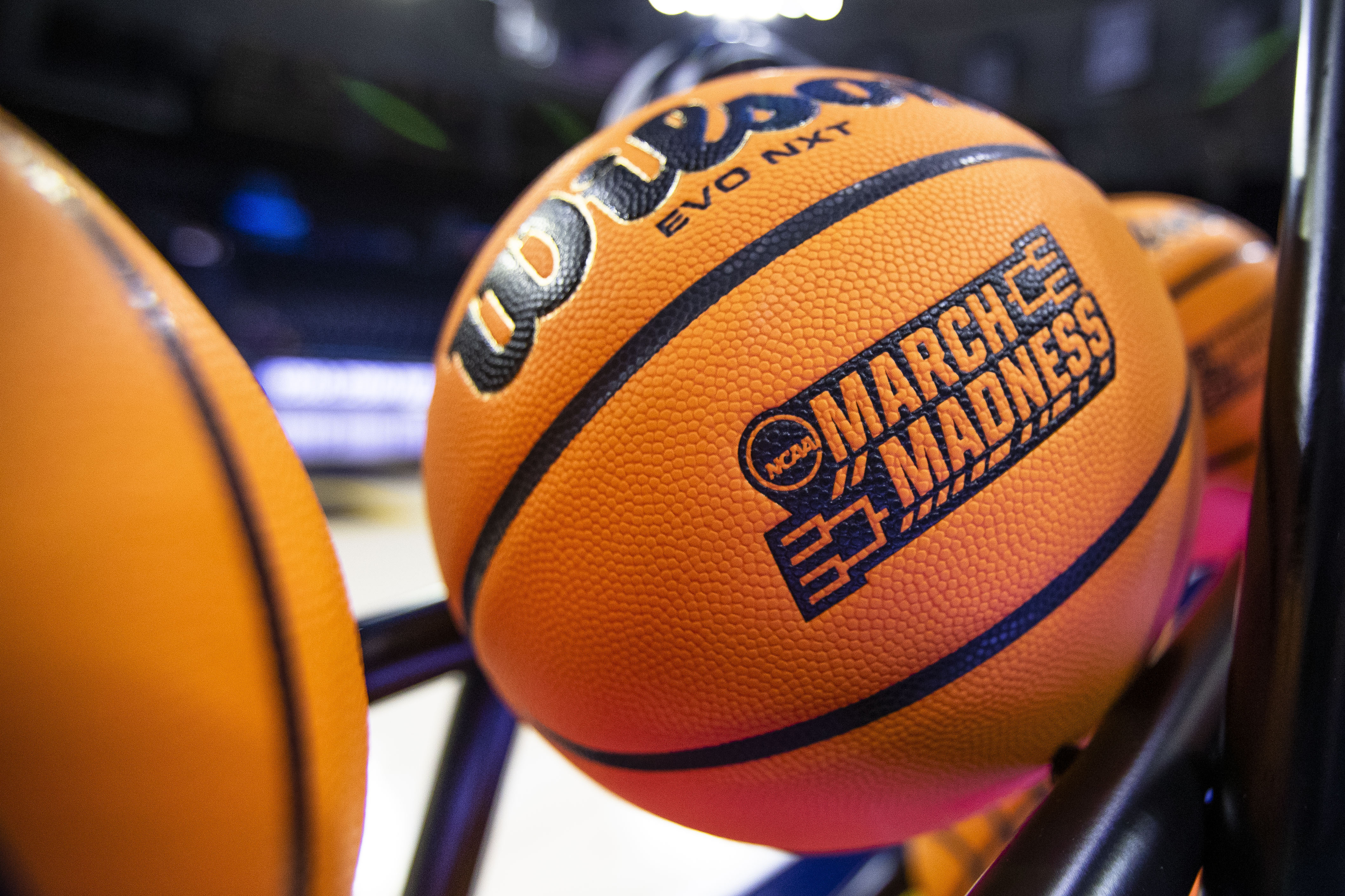 Dynamic 2026 NCAA Tournament college basketball scene with glowing blockchain chains overlay and exploding high-odds graphics for prediction market parlays and lotto bets